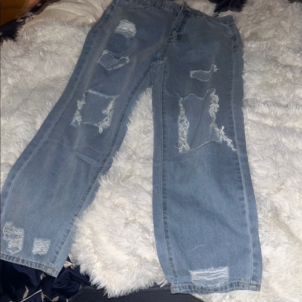 Distressed Light Blue Jeans